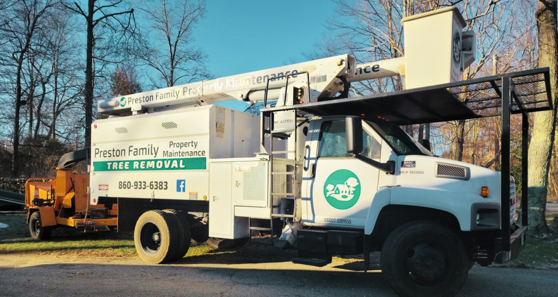 Preston Family Property Maintenance Bucket truck